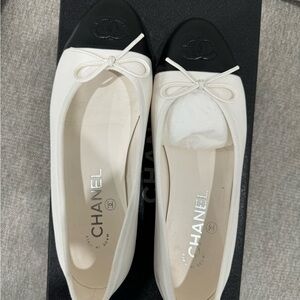 Chanel ballet flats.